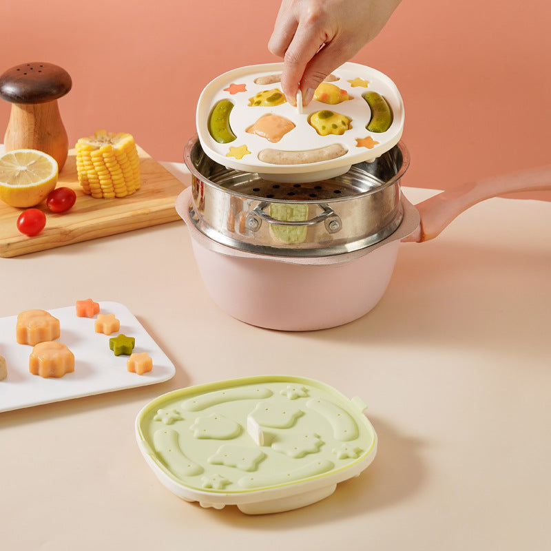 Silicone rice cake mold used for steaming shaped baby food